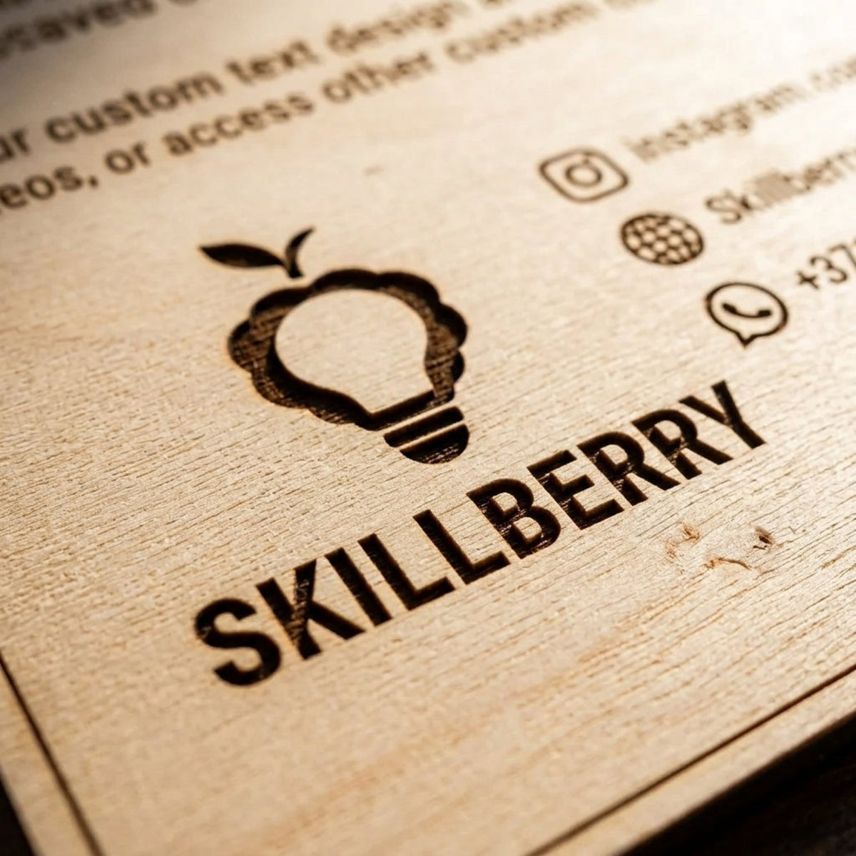 Close-up of the laser-engraved Skillberry logo and contact details on the Smart Menu Board — Skillberry