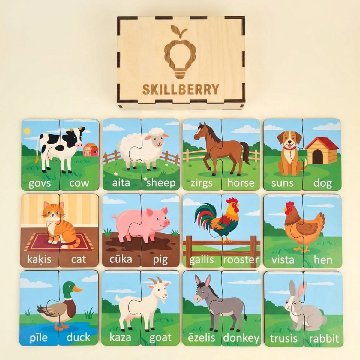 Animal Farm wooden matching puzzle pieces laid out with English-Latvian word pairs and the personalized Skillberry storage box — Skillberry